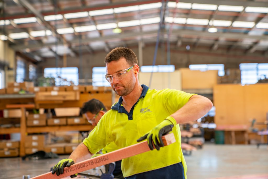 VIP Frames & Trusses timber frames being manufactured in workshop by VIP Frames & Trusses workers