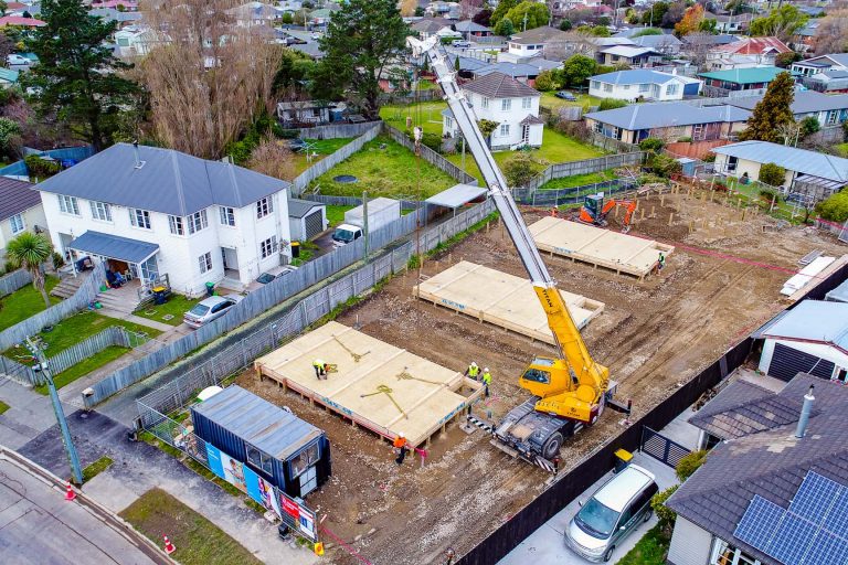 VFT_Mid_Floors_3_7_19_Extra_Small_6 VIP Frames & Trusses timber frames being lowered by crane onsite by VIP Frames & Trusses workers