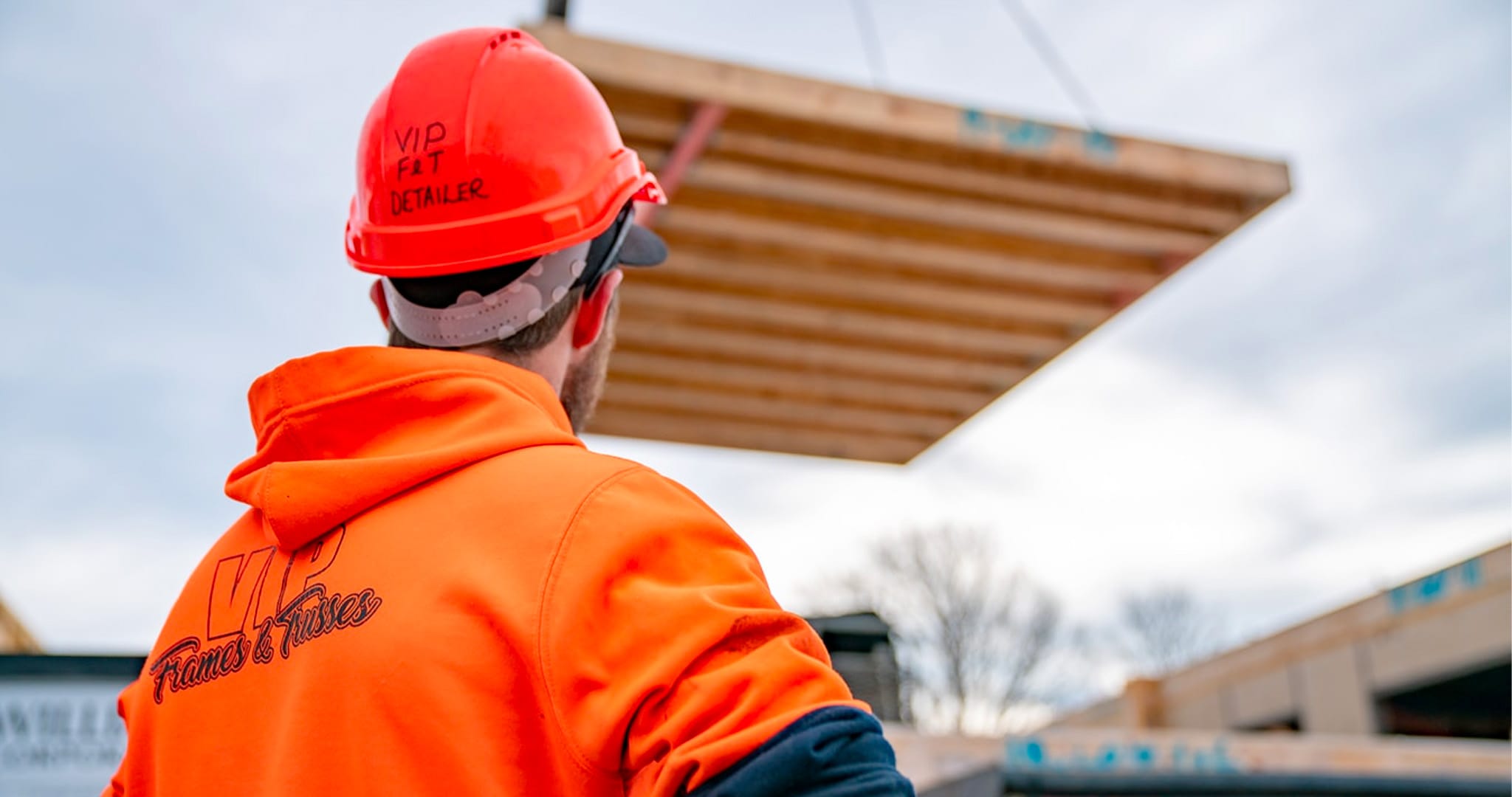 VIP Frames & Trusses employee lowering truss - Christchurch